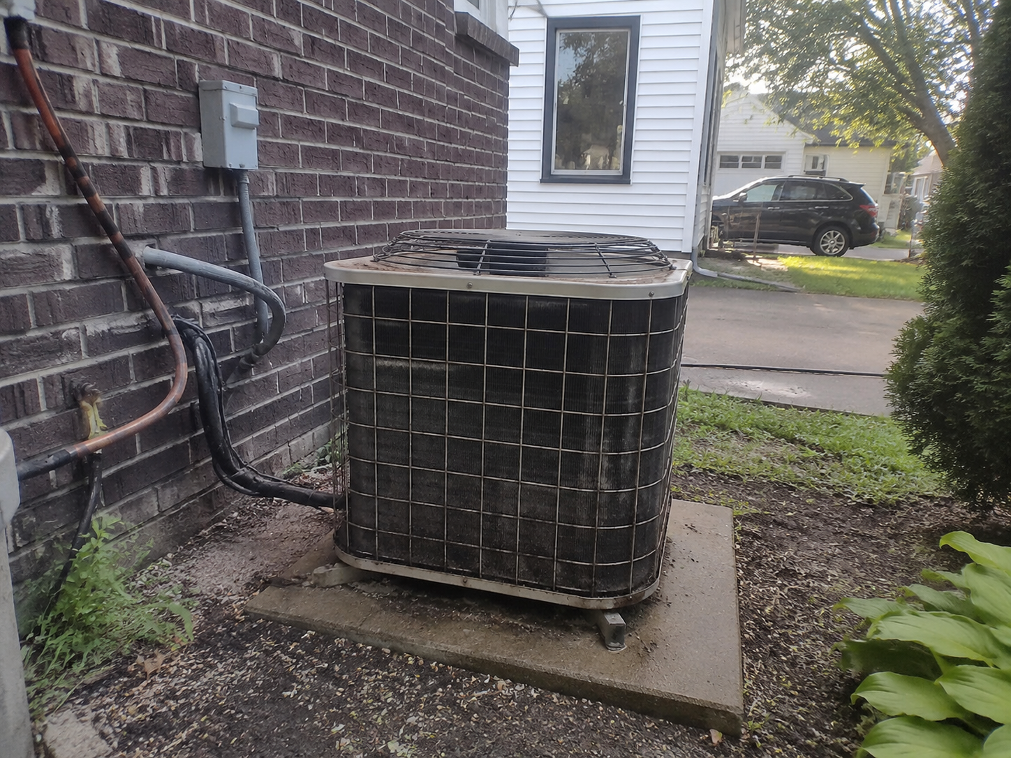 Outdoor AC condenser unit repaired and restored by Cool Air Repair LLC in Cleveland, Ohio. Professional air conditioning repair service completed to restore cooling performance